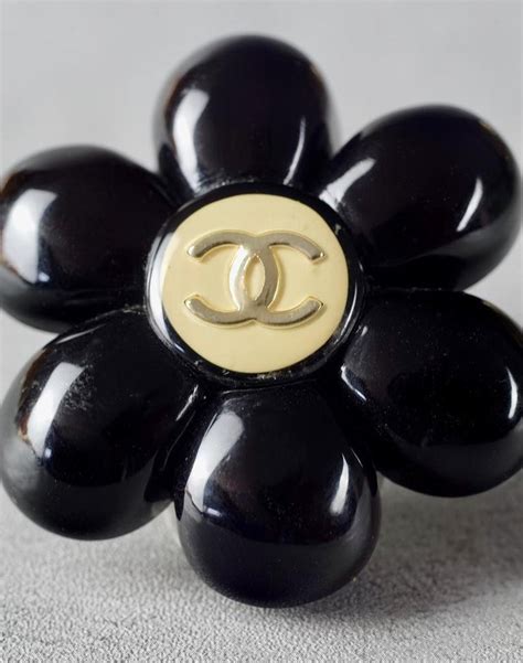 chanel camellia brooch black|Chanel vintage brooch.